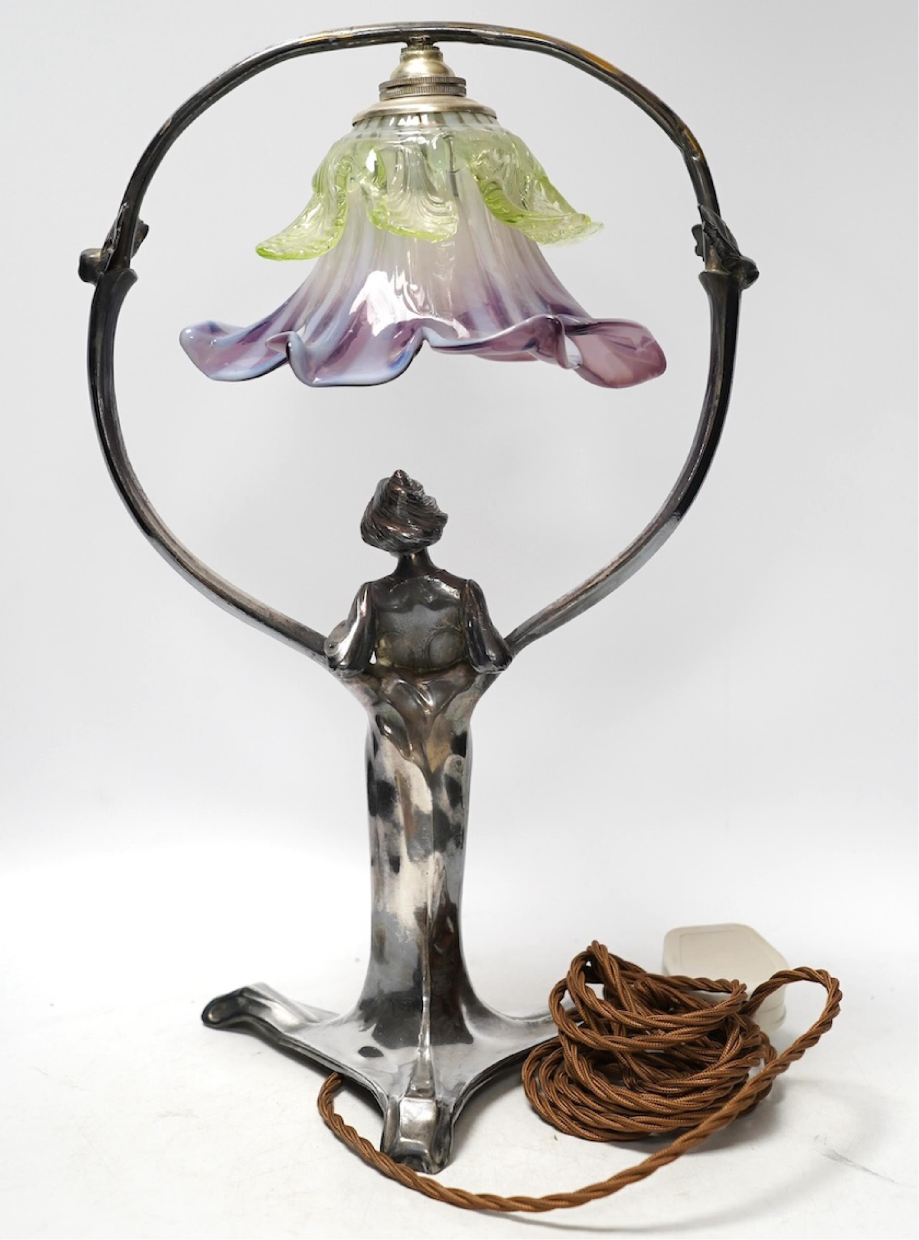 An Art Nouveau WMF pewter and glass flower shade lamp, 39cm high. Condition - split to base on one leg, otherwise good